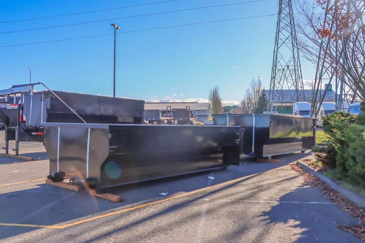 Roll-off dumpster ready for waste disposal at job site for Cleanout Dumpster Rental in Norwood